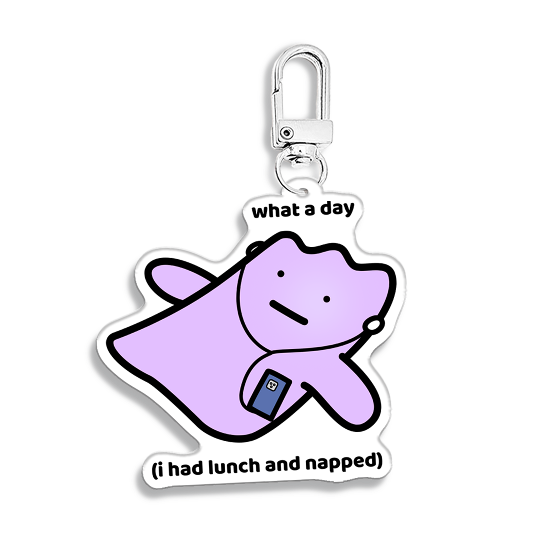 waterproof acrylic keychain with the text “What a day (I had lunch and napped)"