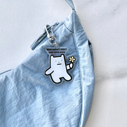 waterproof bear acrylic keychain with the text “Think twice? I didn't even think once" on a bag