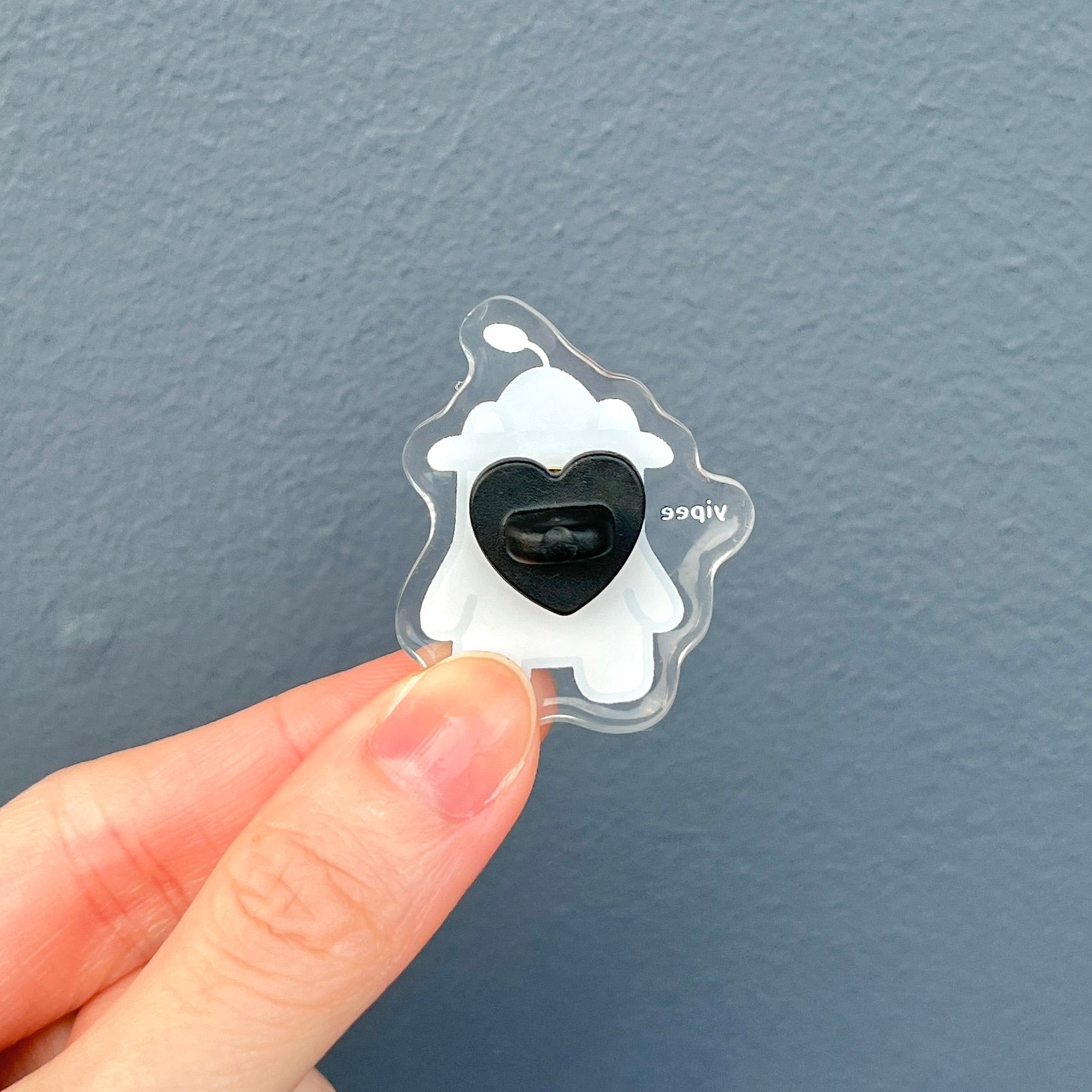back of waterproof bear acrylic pin with the text "Yipee"