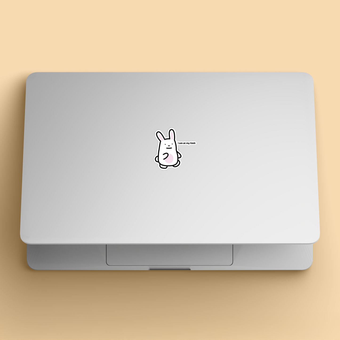 waterproof bunny vinyl sticker with the text "I am at my limit" on a laptop