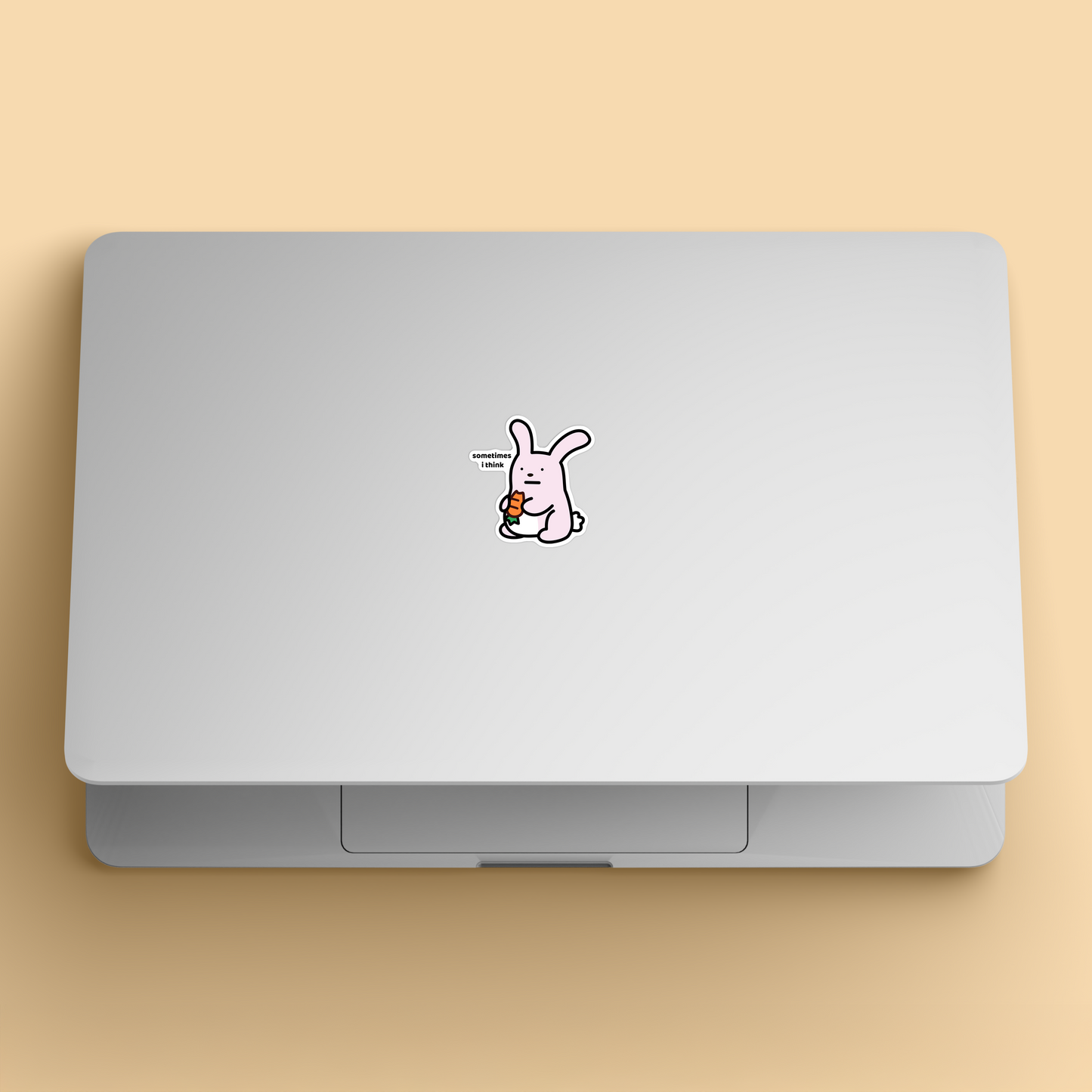 waterproof bunny vinyl sticker with the text “Sometimes I think" on a laptop