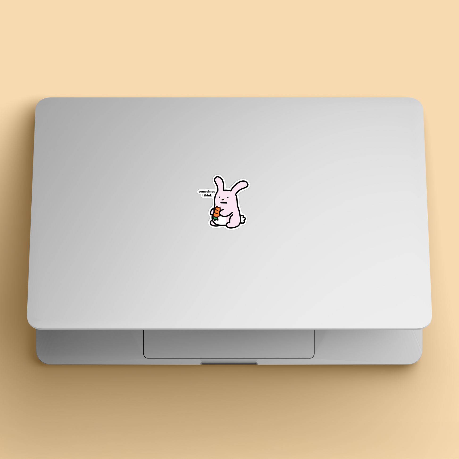 waterproof bunny vinyl sticker with the text “Sometimes I think" on a laptop
