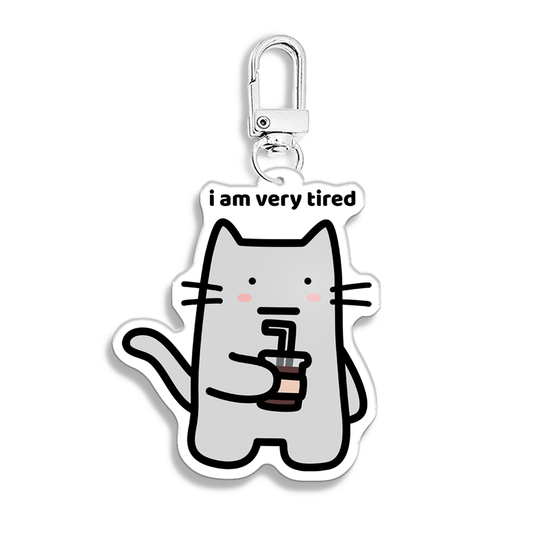 waterproof cat acrylic keychain with the text “I am very tired"