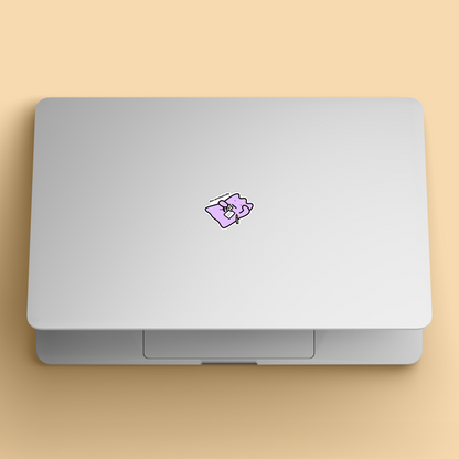 waterproof vinyl sticker with the text “Dies aesthetically" on a laptop