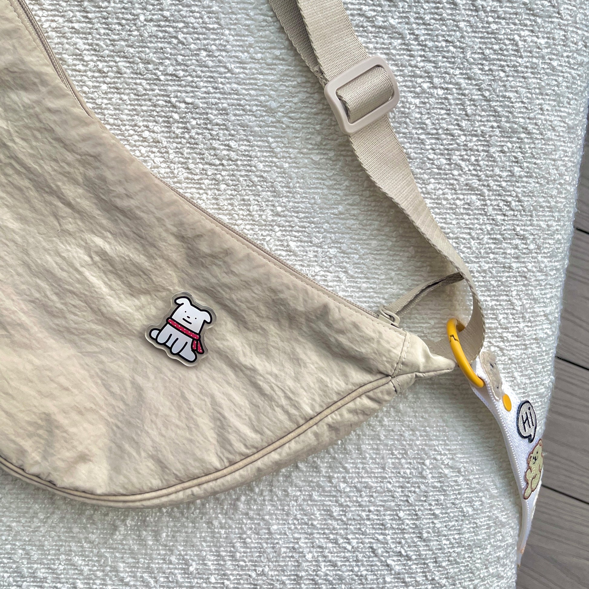 waterproof dog acrylic pin on a bag