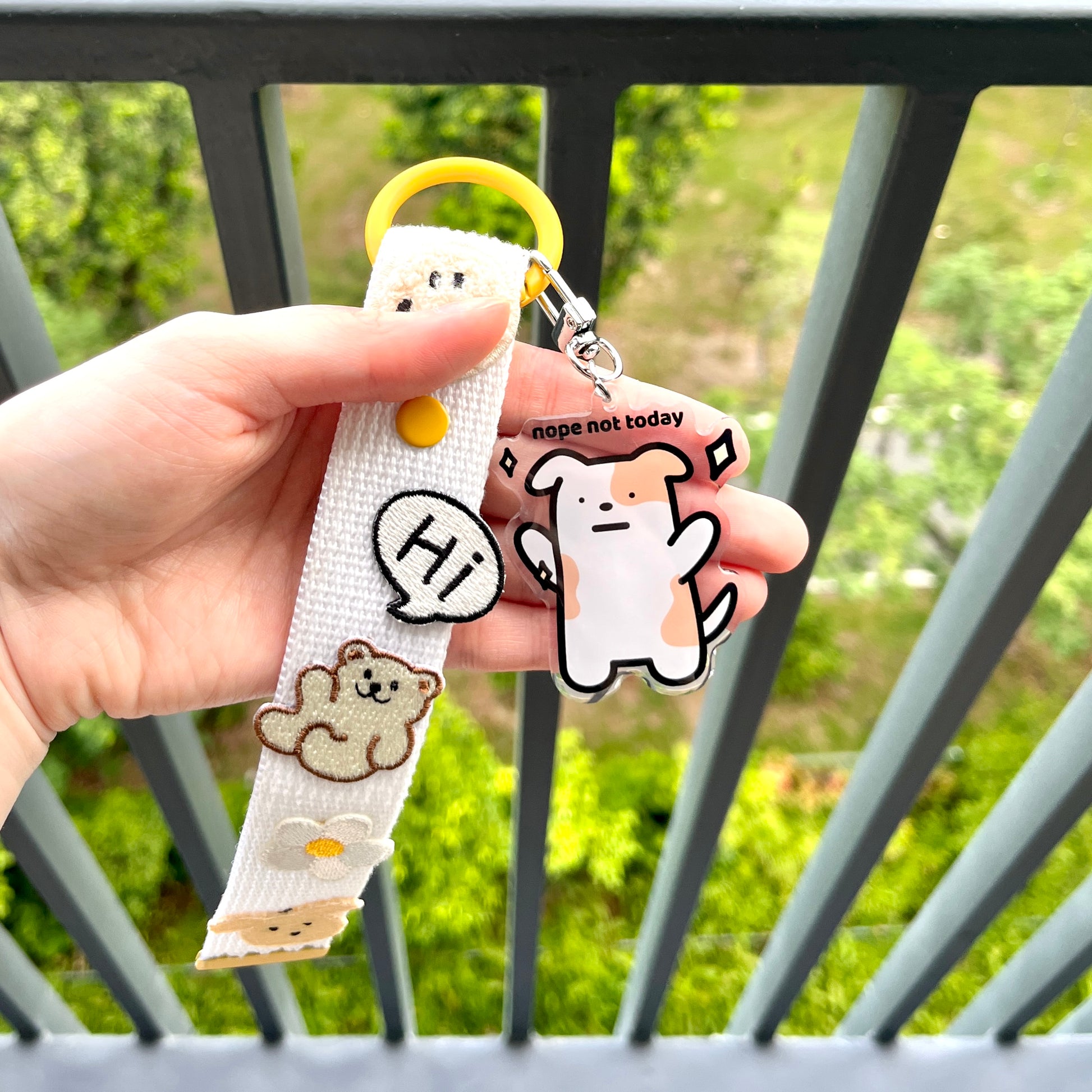 waterproof-dog-keychain-nope-not-today on a person's hand