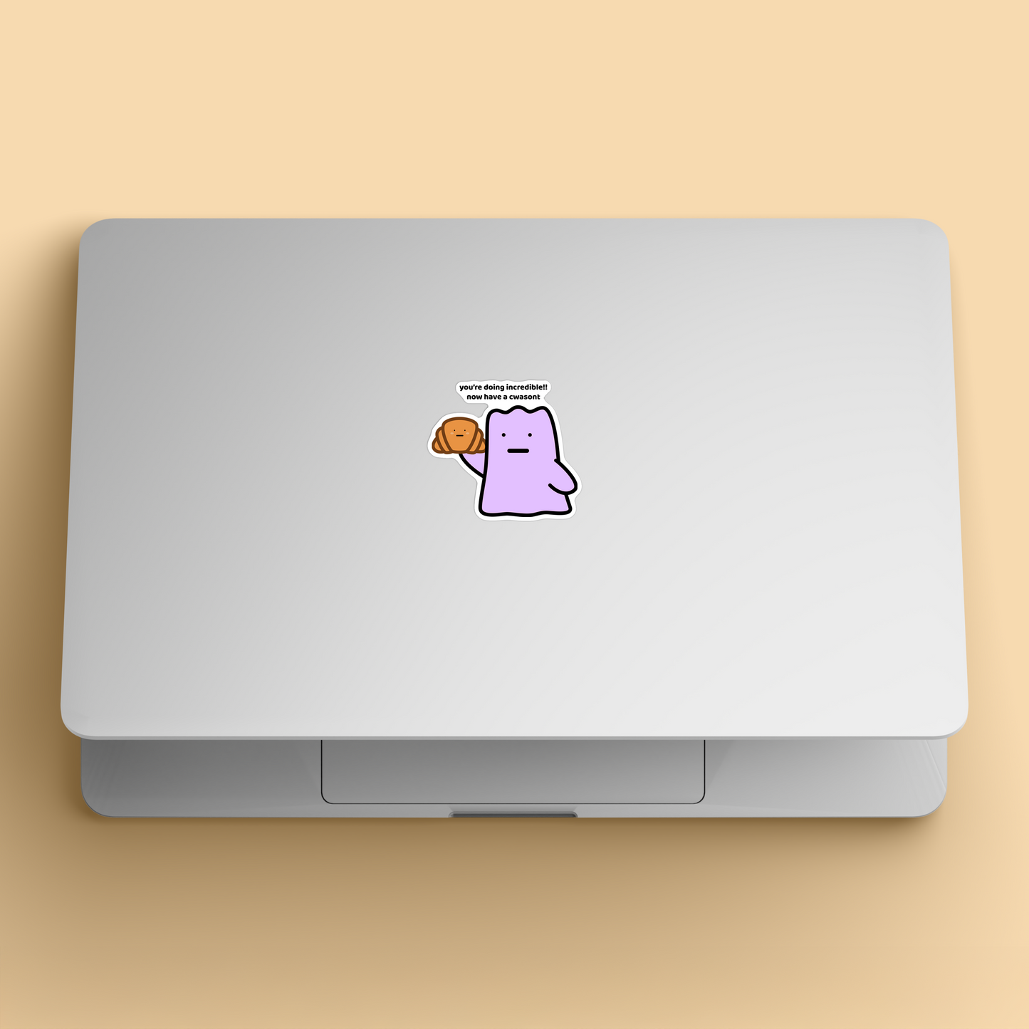 waterproof vinyl sticker with the text “Youre doing incredible!! Now have a cwasont" on a laptop
