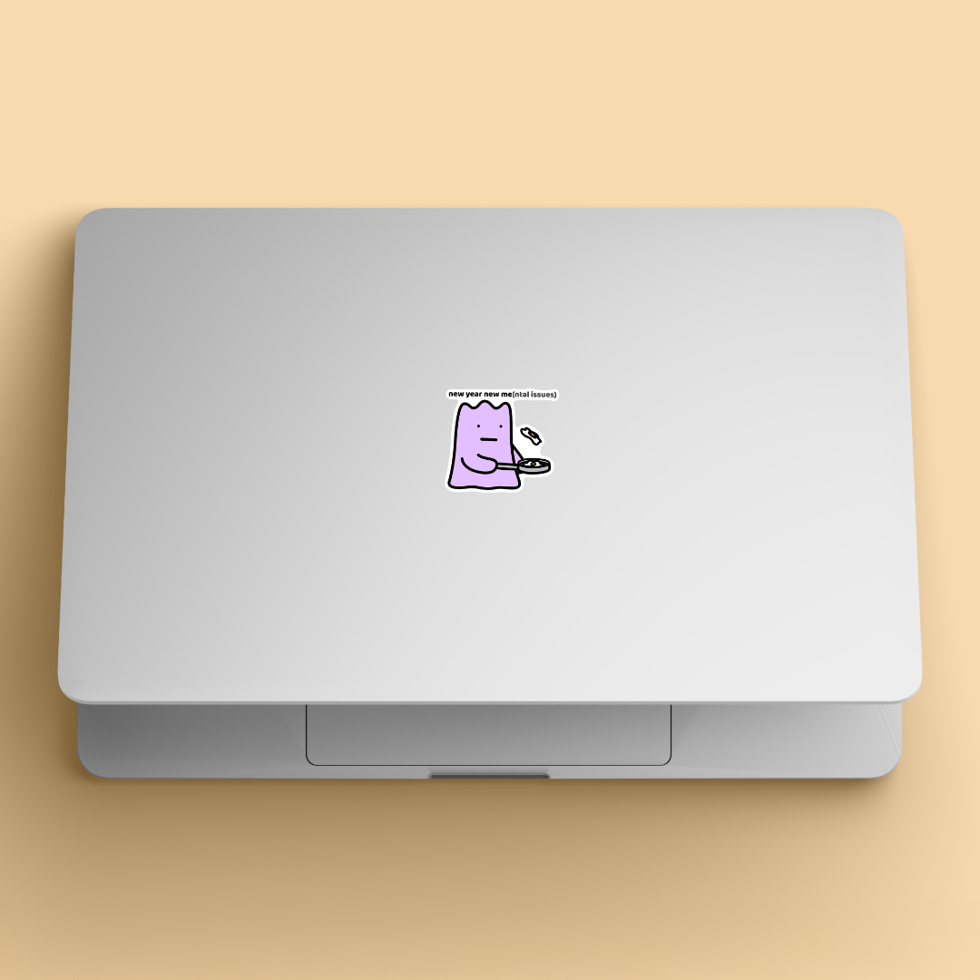 waterproof vinyl sticker with the text “New year new mental issues" on a laptop