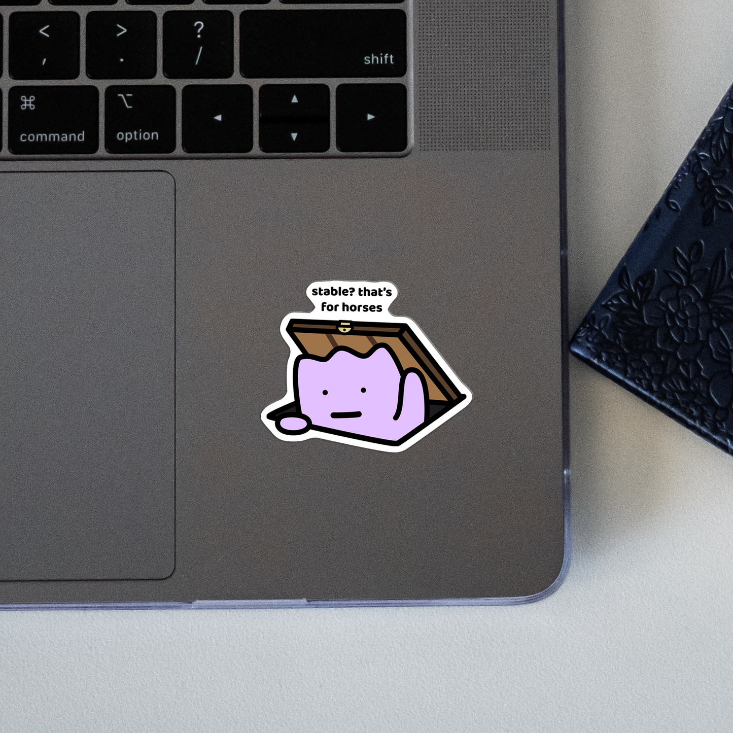 closeup of waterproof vinyl sticker with the text “Stable? That's for horses"