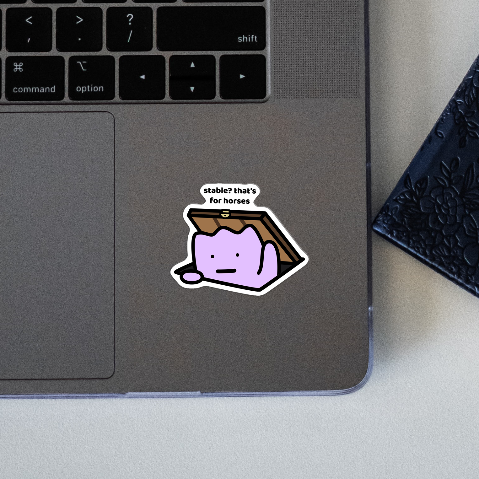 closeup of waterproof vinyl sticker with the text “Stable? That's for horses"