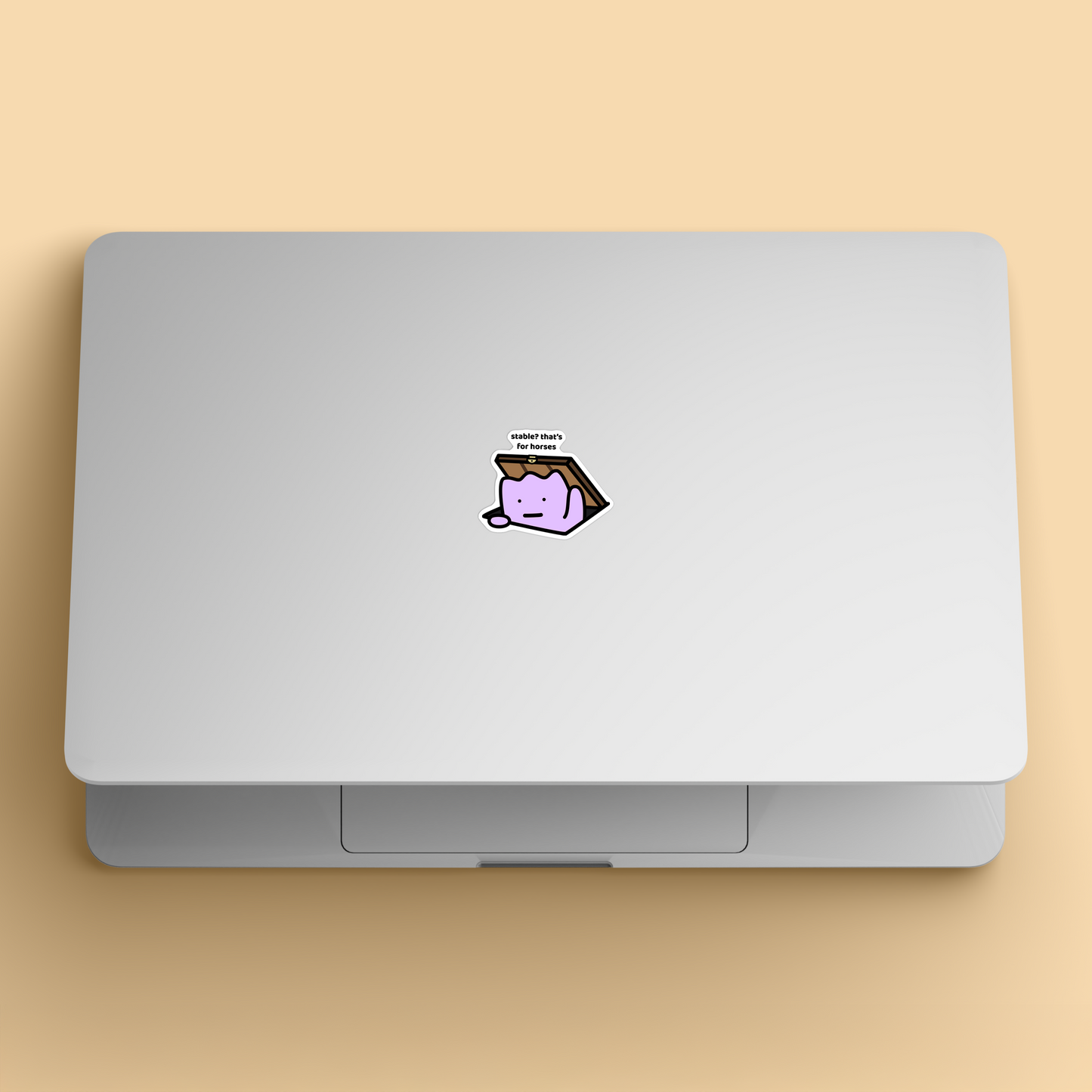 waterproof vinyl sticker with the text “Stable? That's for horses" on a laptop