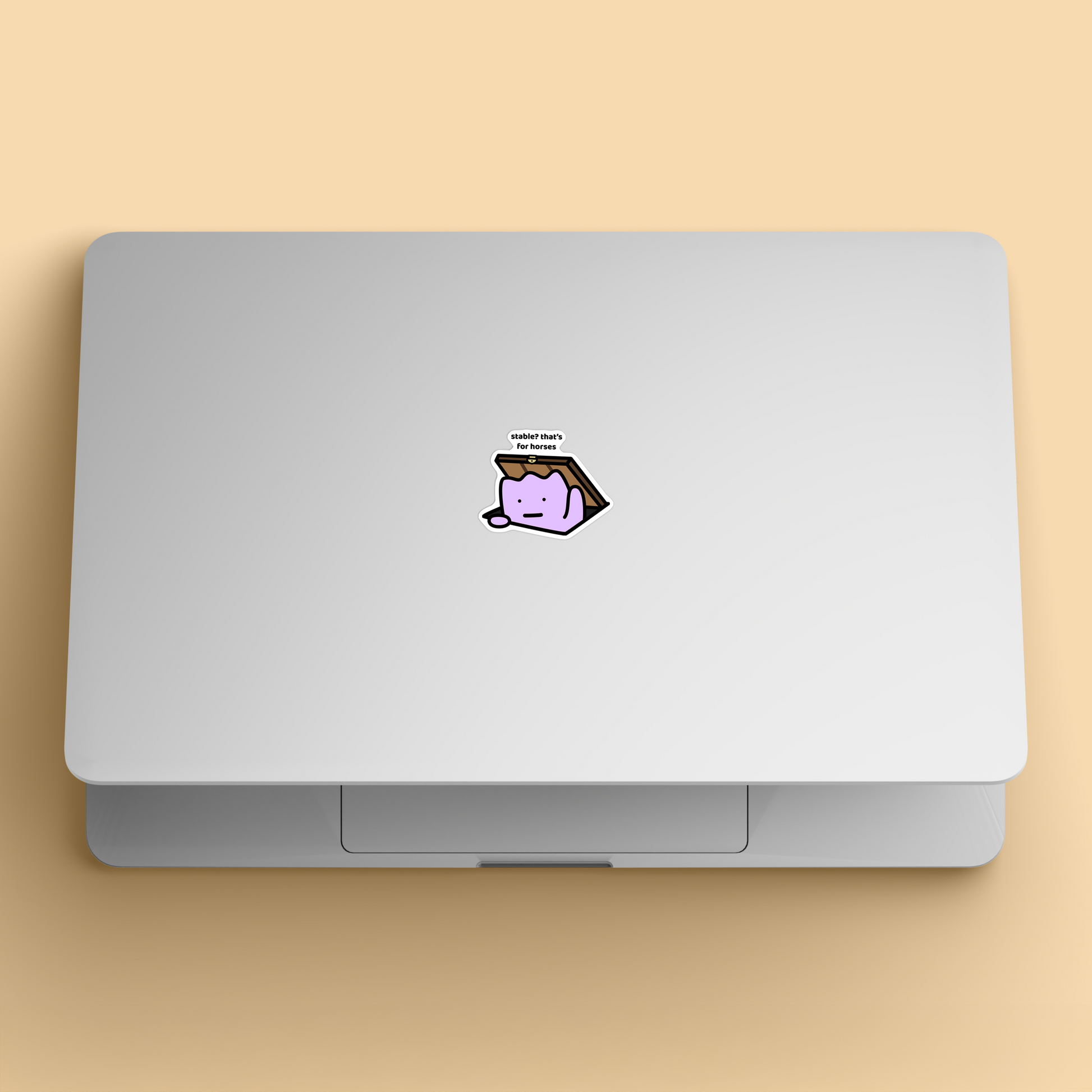 waterproof vinyl sticker with the text “Stable? That's for horses" on a laptop